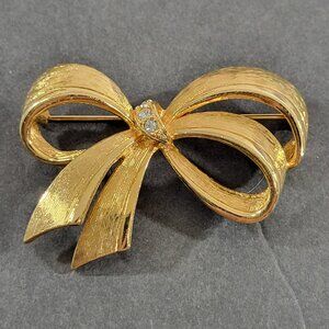 Avon April Birthstone Ribbon Bow Brooch Gold Tone Rhinestone 2.5" Vintage